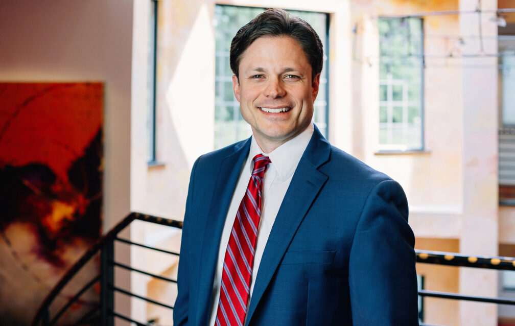 Jon Alhart in the Dixon Schwabl + Company office