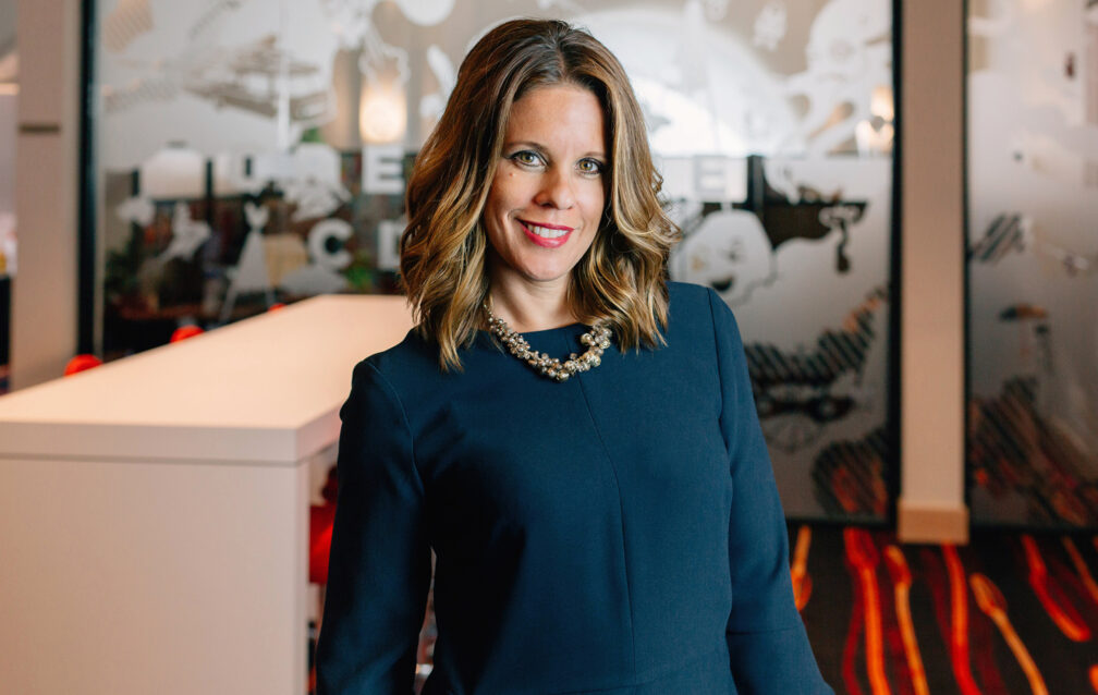 Kim Allen in the Dixon Schwabl + Company office