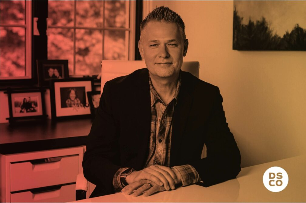 Mark Stone with red to yellow gradient and a DSCO logo