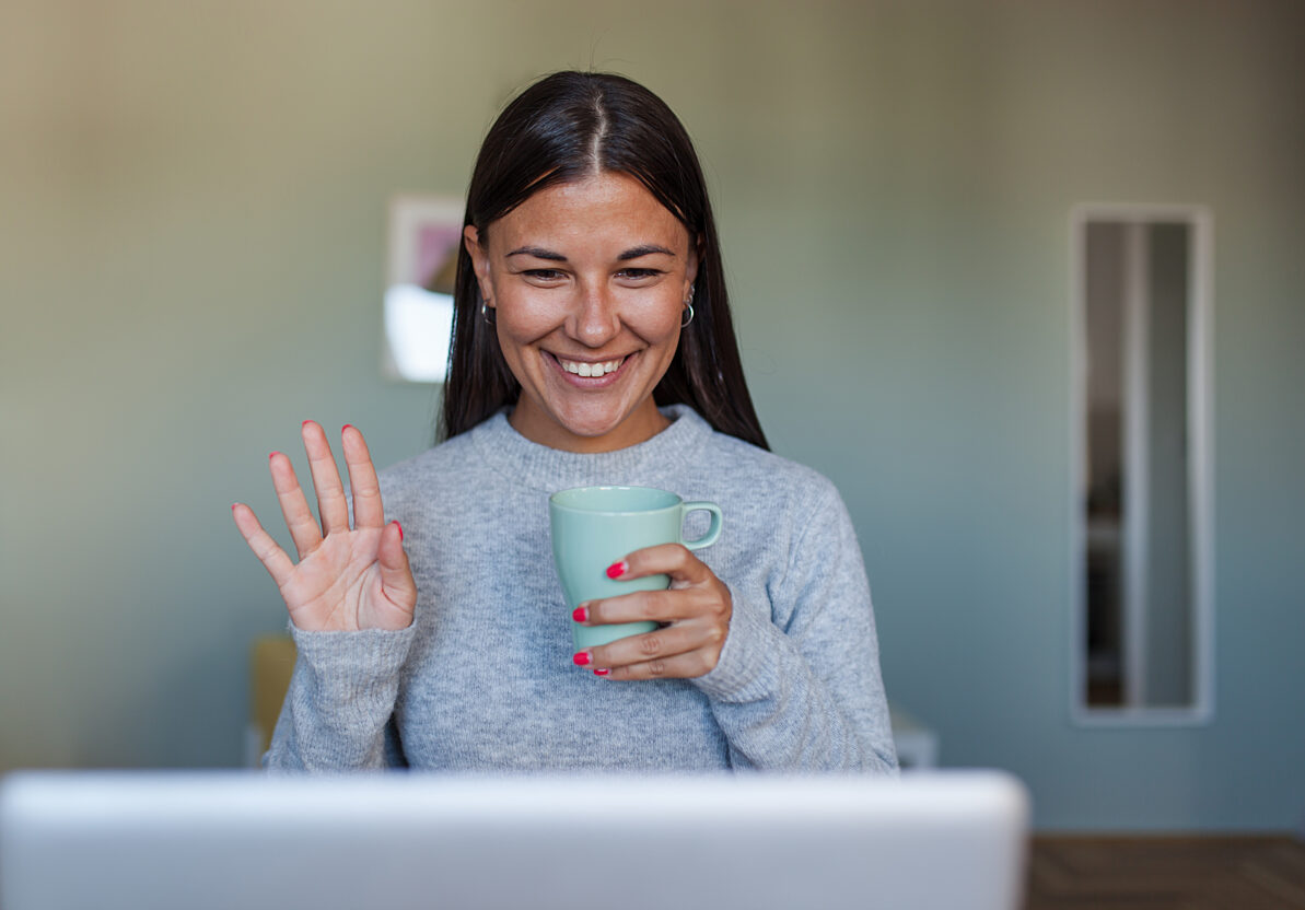 Girl Waving Laptop