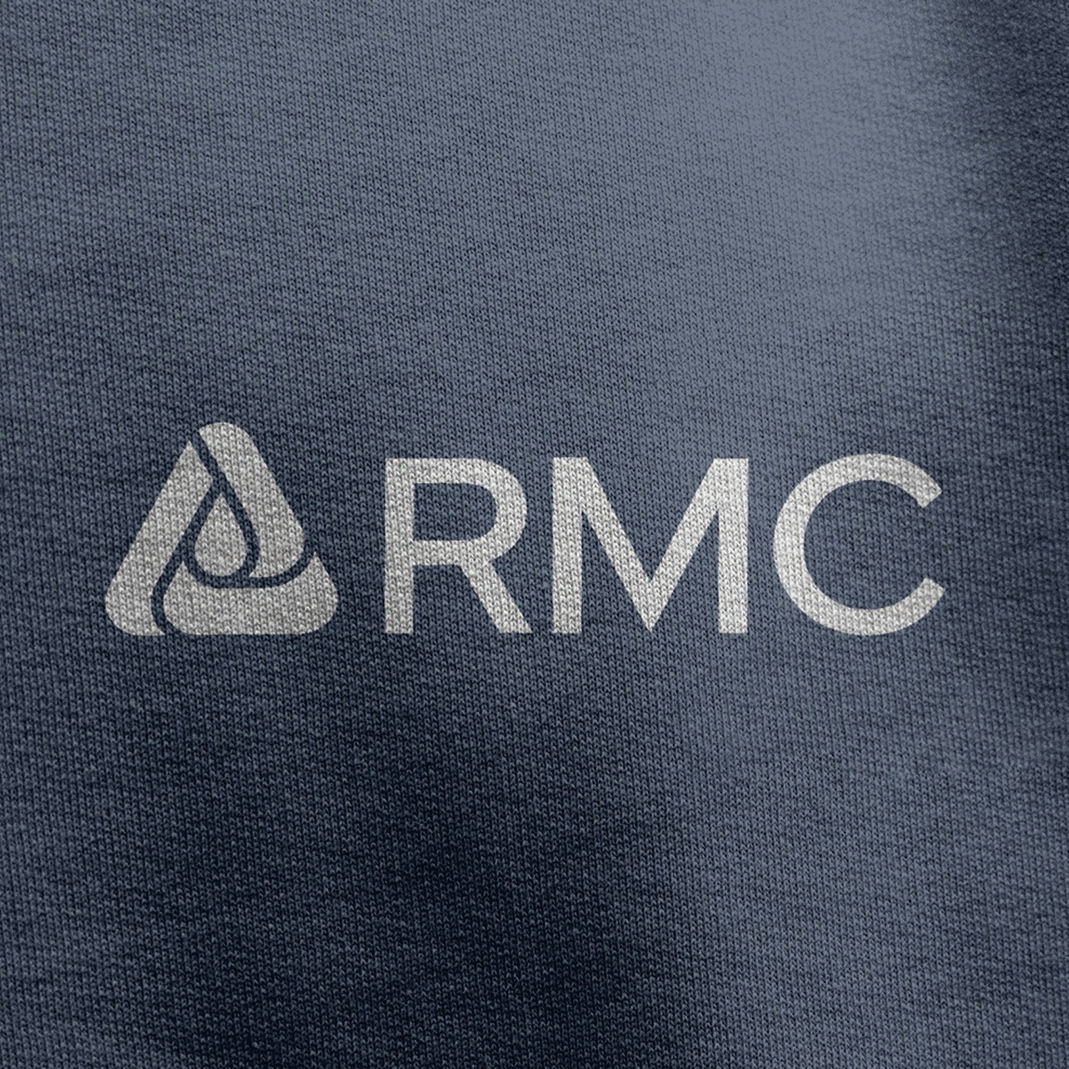 The updated RMC logo printed on textile